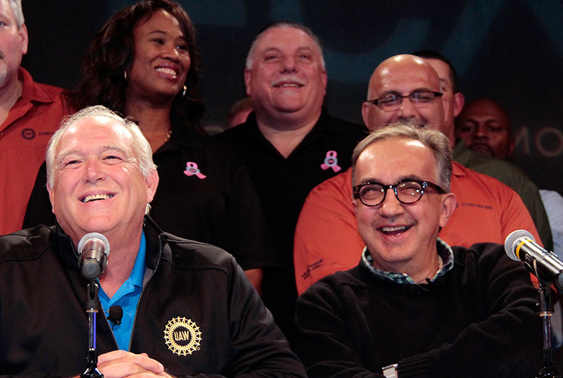UAW President Dennis Williams (left) and FCA US CEO Sergio Marchionne announced that a tentative collective bargaining agreement had been reached, covering nearly 40,000 represented members, during a press conference at the UAW-Chrysler National Training Center in Detroit.