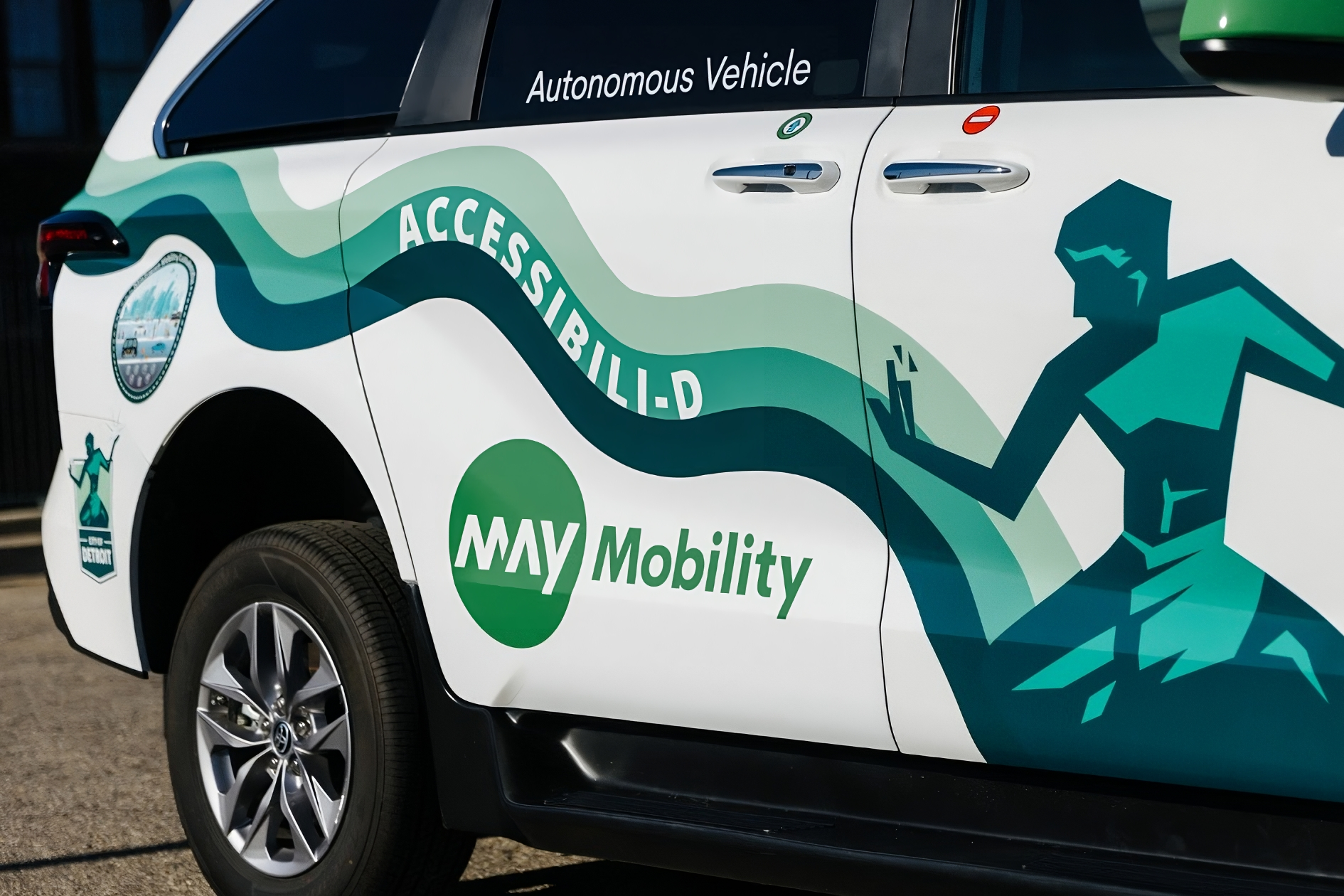 AV May Mobility vehicle logo